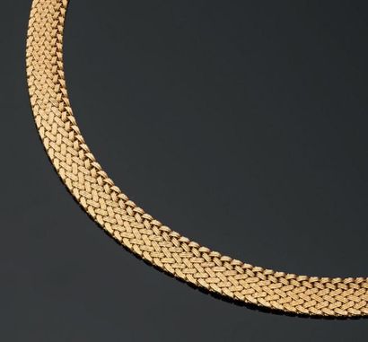 Collier souple en or jaune amati souligné...