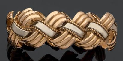 Bracelet articulé en ors jaune et gris formé...