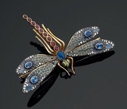 Grande broche en or jaune et argent en forme...