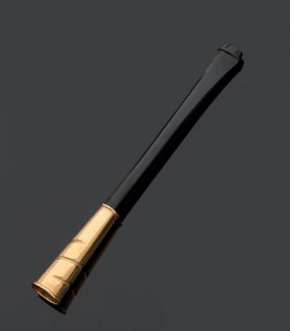 CARTIER
Fume-cigarettes en composition noire,...