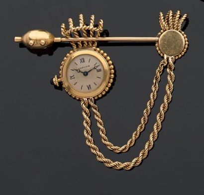 CARTIER, Paris
Broche épingle en or jaune...