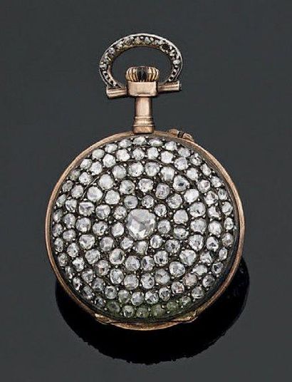 Montre de col en or jaune et argent à lunette...