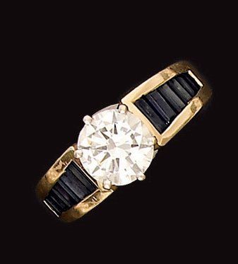 Bague solitaire en or, ornée d'un diamant...