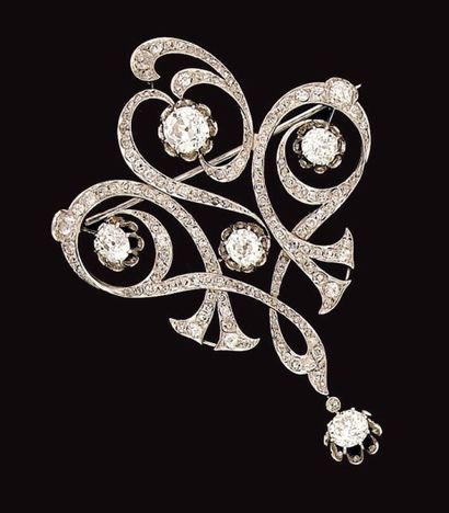 Broche entrelacs en platine, sertie de diamants...