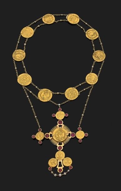 Collier en or jaune (750) formé de deux chainettes,...