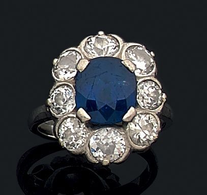 Bague de forme marguerite en platine (950)...