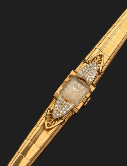 MOVADO
Montre-bracelet de femme en or jaune...