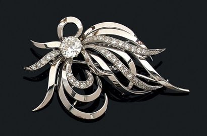 Broche en or gris (750) poli et platine (950)...