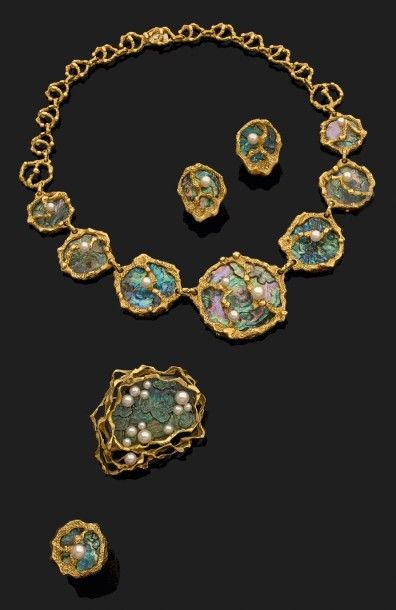Parure sur le thème marin en or jaune (750)...