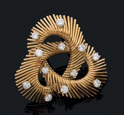 MELLERIO
Paris Clip de revers en forme de...