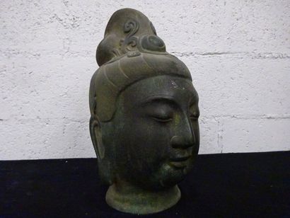 Tête de Bouddha. Epreuve en bronze à patine...