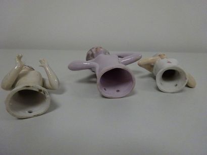 Lot de trois demi-figures en porcelaine....