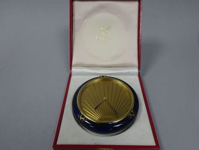 CARTIER
Pendule de voyage, lunette émaillée...