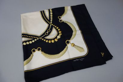 MUST de CARTIER
Foulard en soie imprimée...