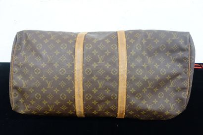 LOUIS VUITTON
Modèle Keepall. Sac en toile...