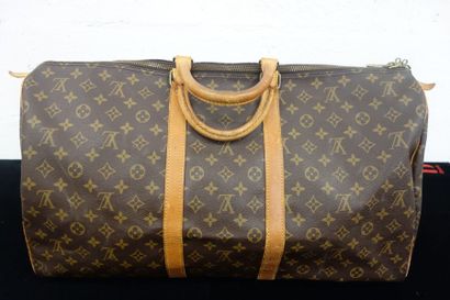 LOUIS VUITTON
Modèle Keepall. Sac en toile...