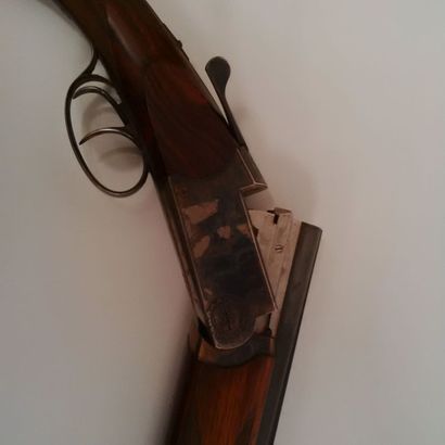 MARTIN-DUBOST Fusil de chasse à canons superposés....
