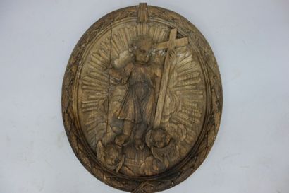 L'Enfant Jésus entouré d'anges. Médaillon...