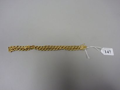 Bracelet gourmette en or jaune (750) à double...