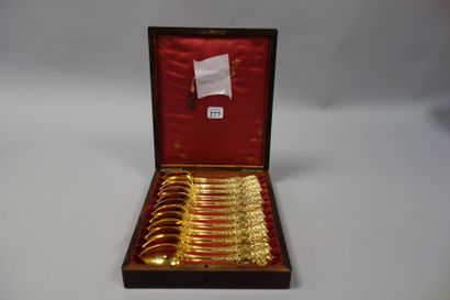 Douze cuillères à café en argent doré (925)...