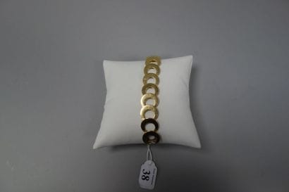 Bracelet en or jaune (750) formé d'une frise...
