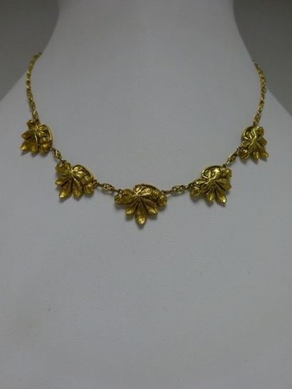 Collier draperie en or jaune (750) formé...