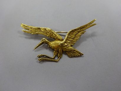 Broche en or jaune (750) figurant une cigogne.

Poids...
