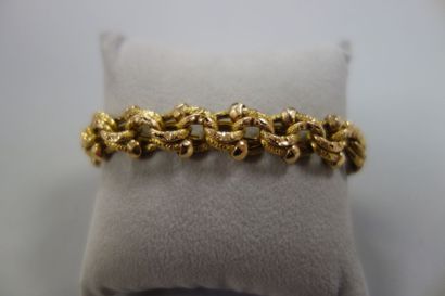 Bracelet articulé en or jaune (750) à maille...