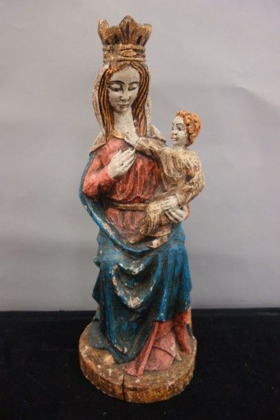 Groupe en bois sculpté polychrome représentant...