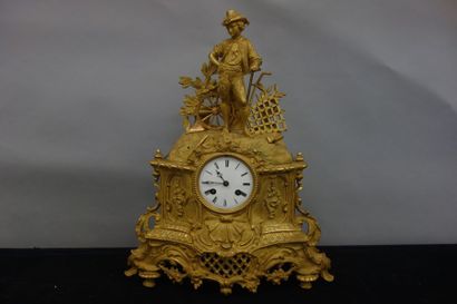 Pendule au laboureur en bronze doré et laiton,...