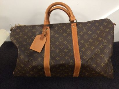 LOUIS VUITTON
Sac modèle Keepall 45 cm.

En...