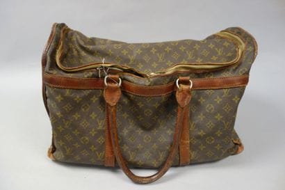 LOUIS VUITTON
Sac de voyage en cuir naturel...