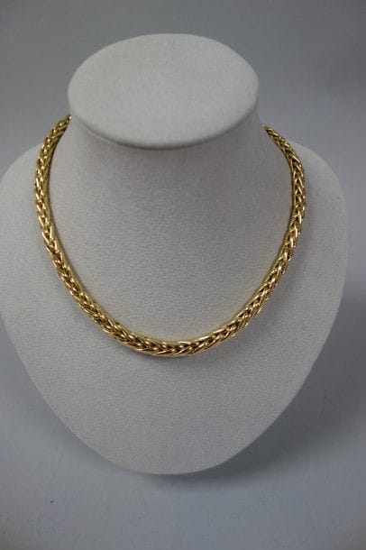 Collier en or jaune (750) à maille palmier....