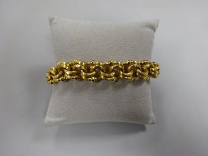 Bracelet souple en or jaune (750) à maillons...