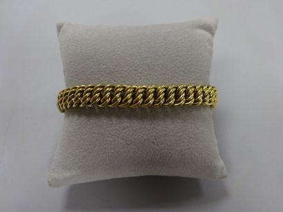 Bracelet souple en or jaune (750) à maillons...