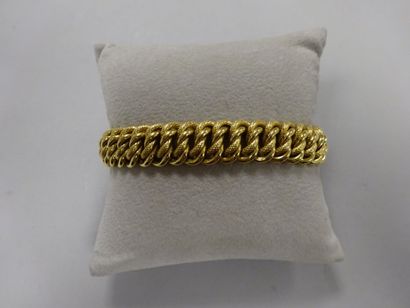 Bracelet souple en or jaune (750) à maillons...