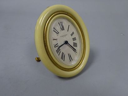CARTIER

Pendulette réveil de forme ovale...
