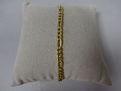 Bracelet en or jaune (750) à mailles gourmettes...
