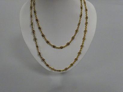 Sautoir en or jaune 14 carats (585) et argent...
