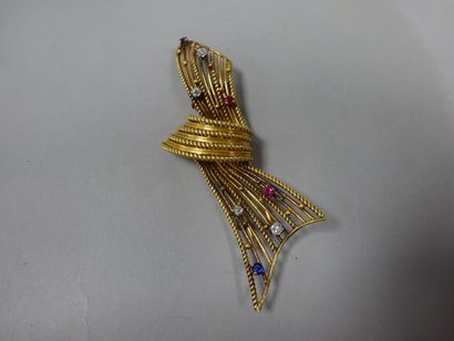 Clip de revers en or jaune (750) figurant...