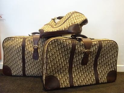 DIOR
Ensemble de trois bagages en toile monogrammée...