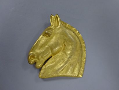 HERMES Paris
Broche tête de cheval en métal...