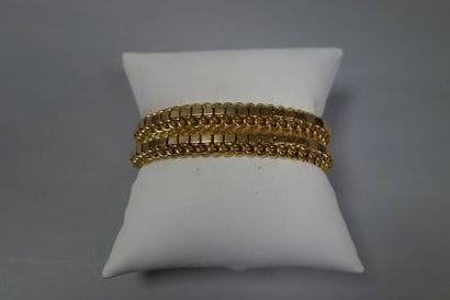 Bracelet en or jaune (750) articulé à maillons...