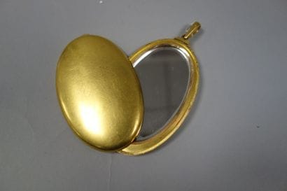 Miroir pendentif ovale, formant porte-photo,...