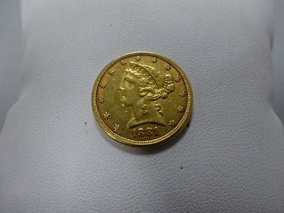ETATS UNIS
Une pièce de 5 dollars en or,...