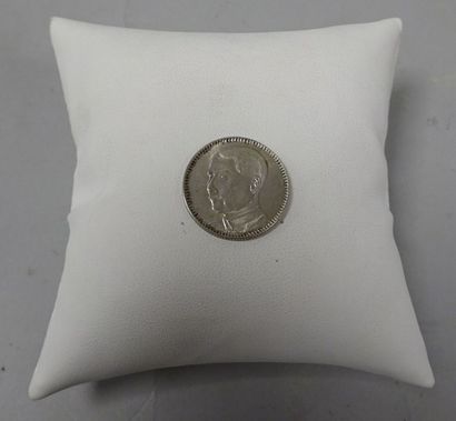 CHINE

Une pièce de 20 cents en argent (925),...