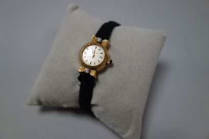 ETERNA MATIC
Montre bracelet de dame en or...