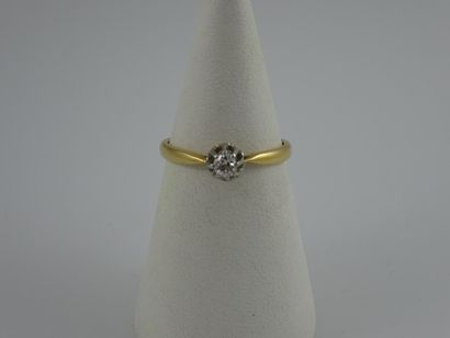 Bague solitaire en or jaune et gris (750)...