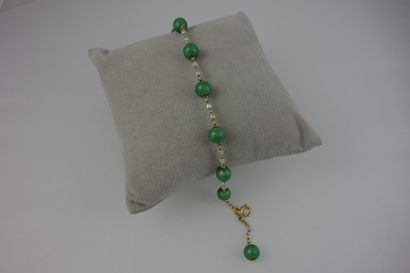 Fin bracelet à pampille en or jaune (750)...