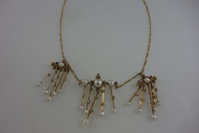 Collier façon draperie en or jaune (750)...